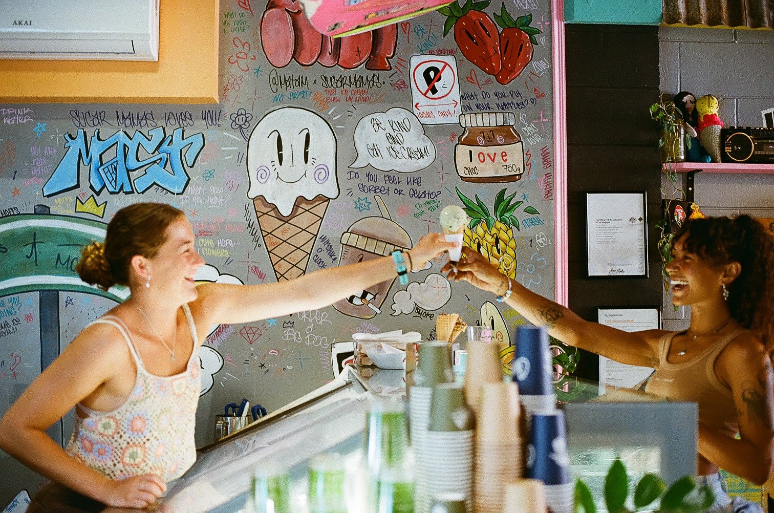 A happy Sugar Mama's community moment at the gelato counter